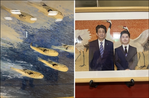 ▲기타가와 복집의 도라후구 그림과 단골손님 아베 전 수상의 모습
