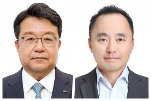 왼쪽부터 한성희 포스코건설 대표와 마창민 DL이앤씨 대표.