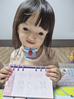 ▲ 월간 한 모금을 통해 의료비 지원을 받은 아동 [사진= 한화호텔앤드리조트 제공]